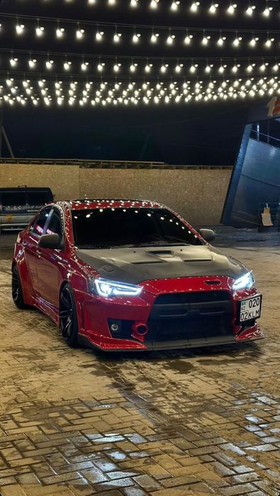 Бампер тюнингованный на митсубиси лансер 10