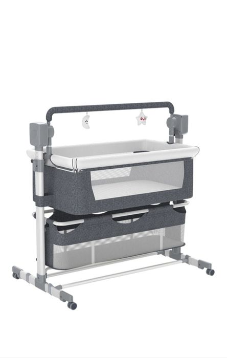 Манеж-кровать, поперечный маятниковый механизм