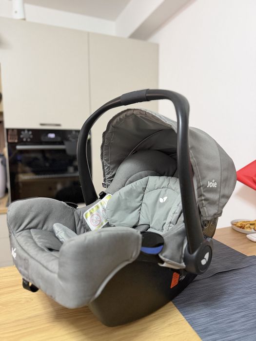 Scoică auto Joie i-Snug cu insertie de nou nascut