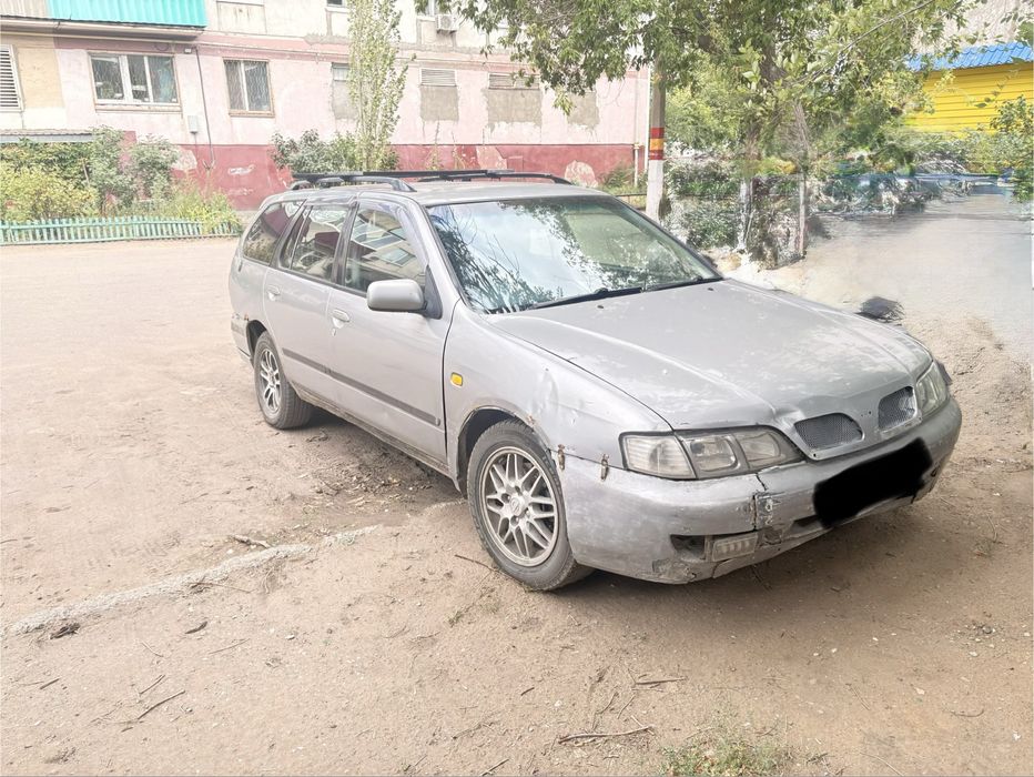 Нисан примера п11