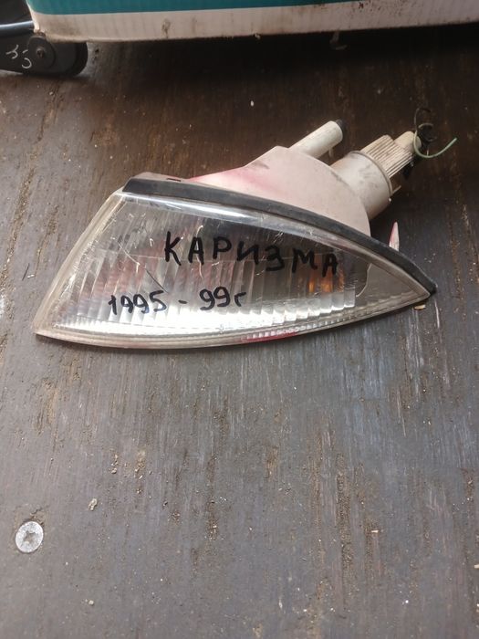 Поворотник Митсубиси Каризма левый