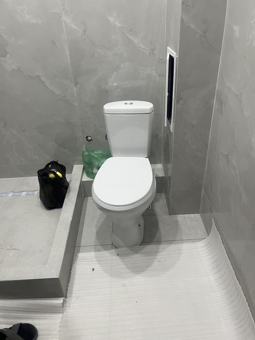 Унитаз с бочком для строительных работ
