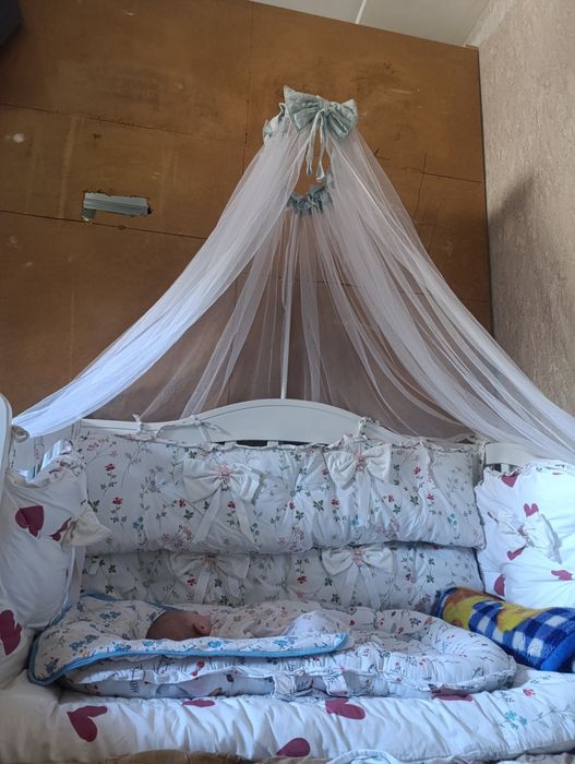 Кроватка для новорожденных