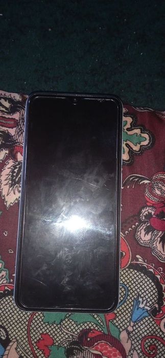 RedmiA1+ yangi telefon mart oyi sotvolingan aybi yòq