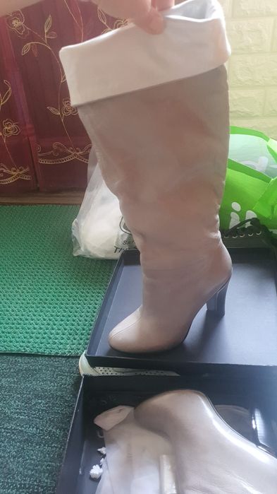 Новые кожанные сапоги