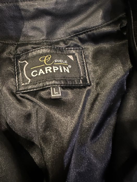 Естествена кожа късо яке,пиши L,но определено е M