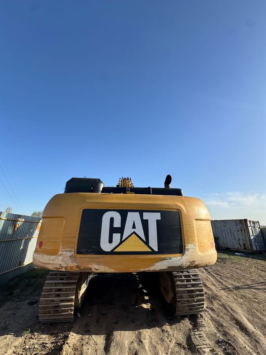 Экскаватор гусеничный Cat