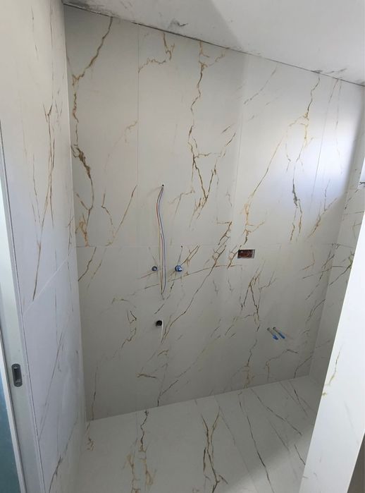 Meserias constructii efectuez lucrari in constructii  apartamente la cheie gresie faianta glet lavabila sape tencuieli etc.
