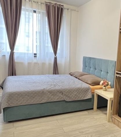 Pat cu lada de depozitare