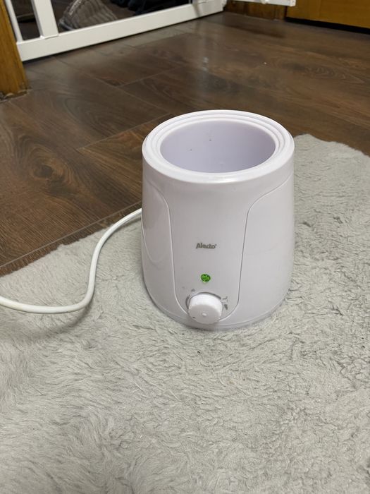 Нагревател за бебешка храна и адаптирано мляко