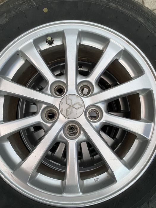 Комплект резины с дисками на Мицубиси