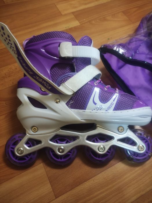 Роликовые коньки