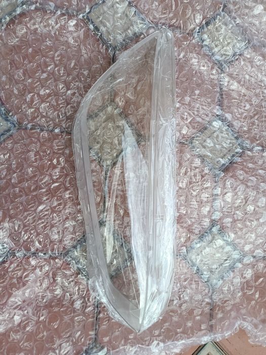 Стекло фары BYD .