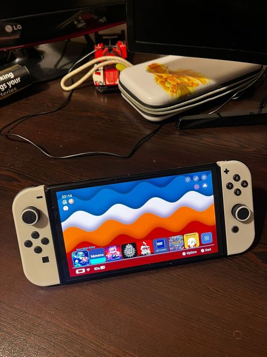 Nintendo Switch OLED 64GB + 512GB SD modat