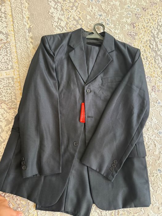 Продам костюм с брюками