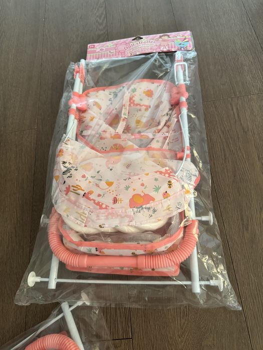 Количка за кукла тип бастун, розово-оранжева с животни