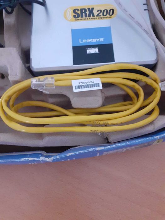 Рутер Linksys, 2,4GHz,с четири кабелни изхода.