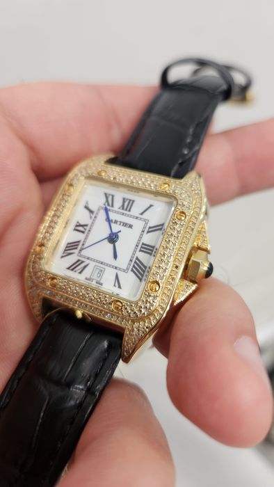 Золотые женские часы Cartier
