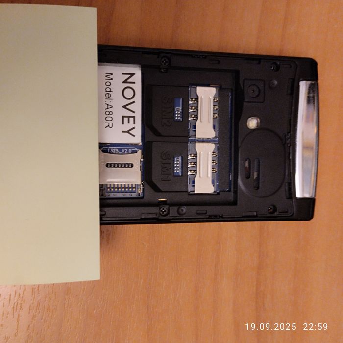 Телефон  Novey A 80 R