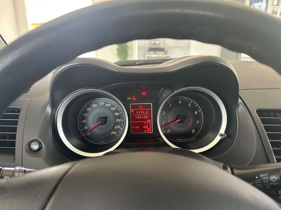 Mitsubishi Lancer Achizitionata de la Tiriiac Auto