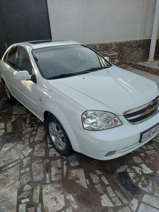 Ласетти 1,6. Цвет белый.