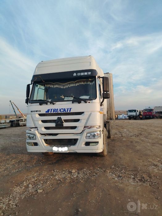 Howo sinotruk  2012 yil oq beliy metan bor
