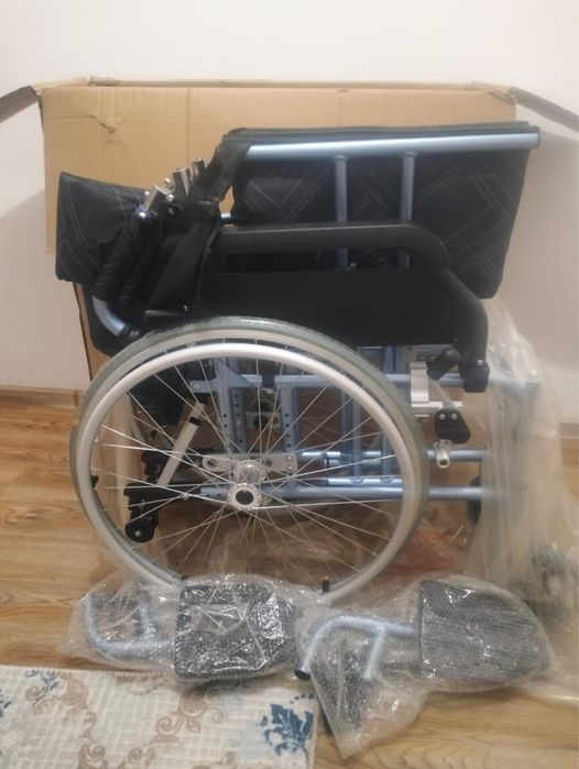 Инвалидная коляска