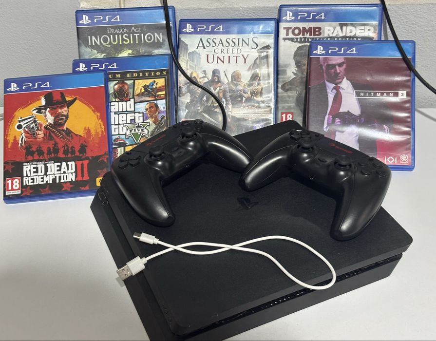 Ps 4 + 2 manete + 6 jocuri