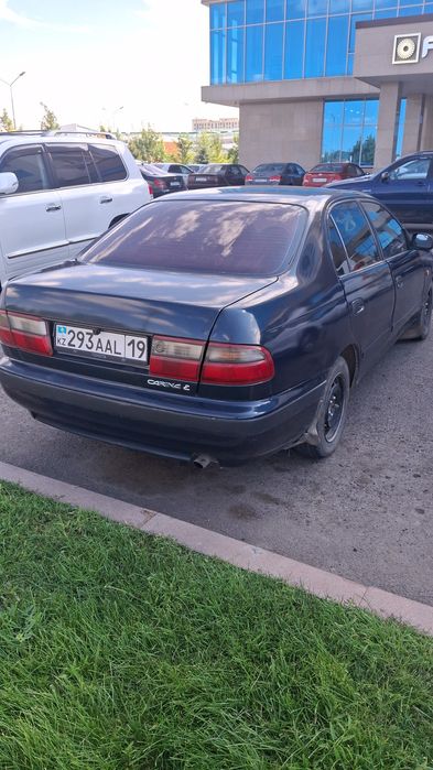 Тоиота карина  е