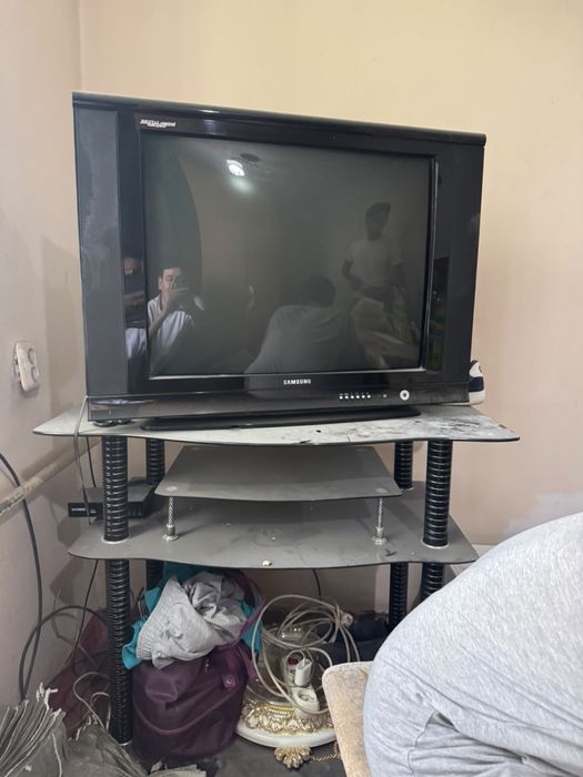 Телевизор приставкасымен