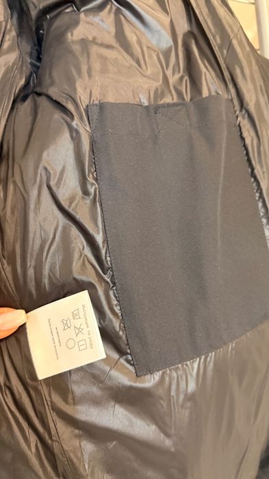 Пуховик черного цвета