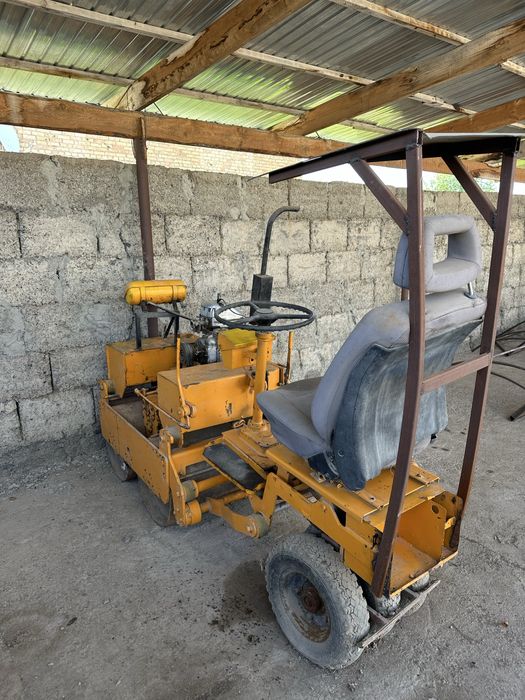 Каток и асфальтный фреза