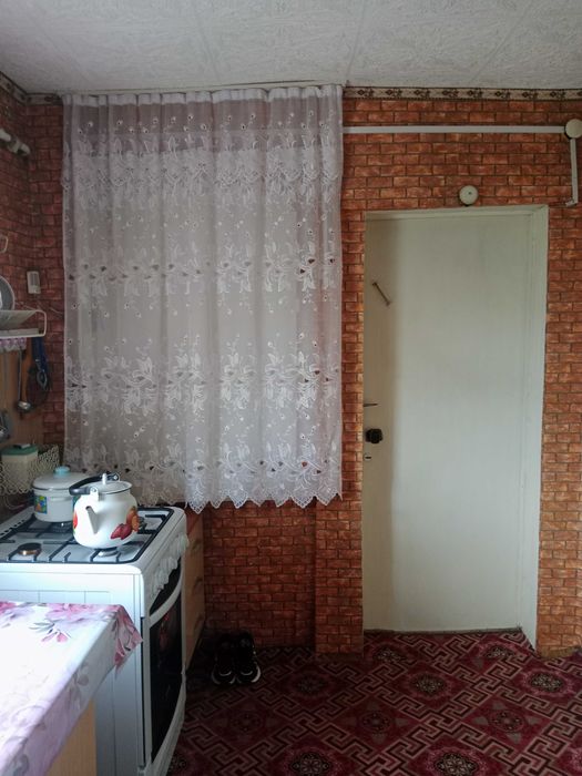 Продам 1/2 дома Военный городок