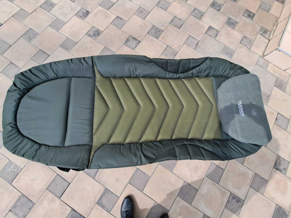 Раскладушка. Складной кровать с металлическим каркасом.