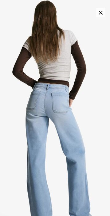 Джинсы голубые BERSHKA