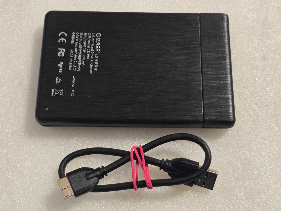 Hard Disk extern slim Orico 1TB, 5400rpm USB 3.0, 2.5" - poze reale
