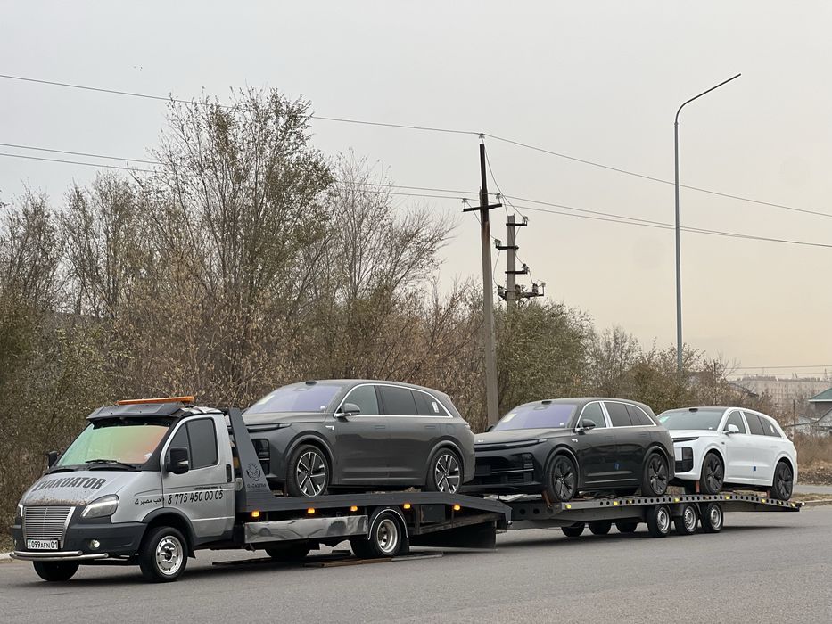 Автовоз-эвакуатор с прицепом