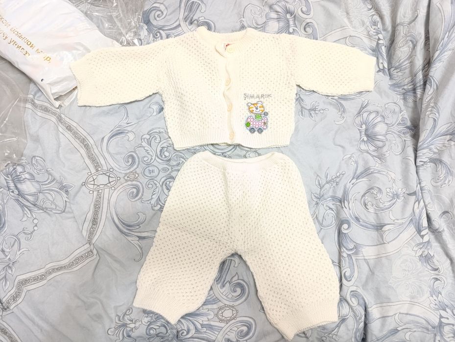 Теплые одежды для малышей