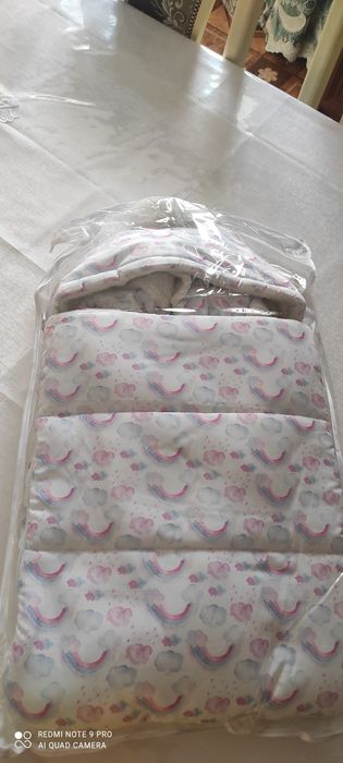 На выписку конверт с комбезом