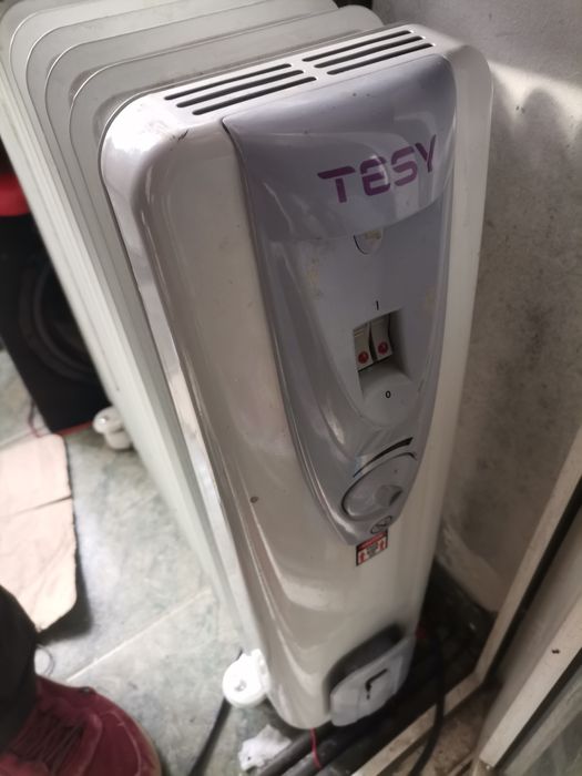 Calorifer electric cu ulei cu 14 elemenți perfect funcțional