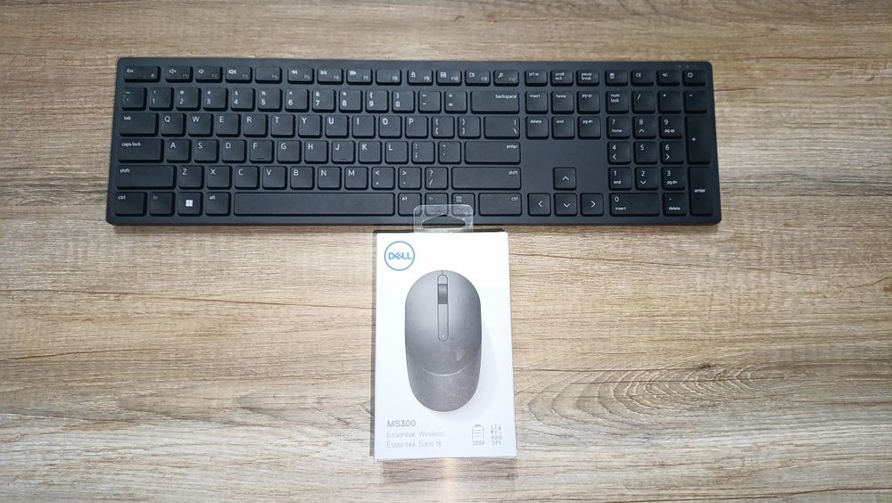 Продам оригинальную беспроводную клавиатуру и мышку DELL