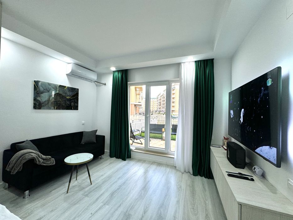 Studio tip garsoniera Cosmopolis parter cu gradina si loc de parcare