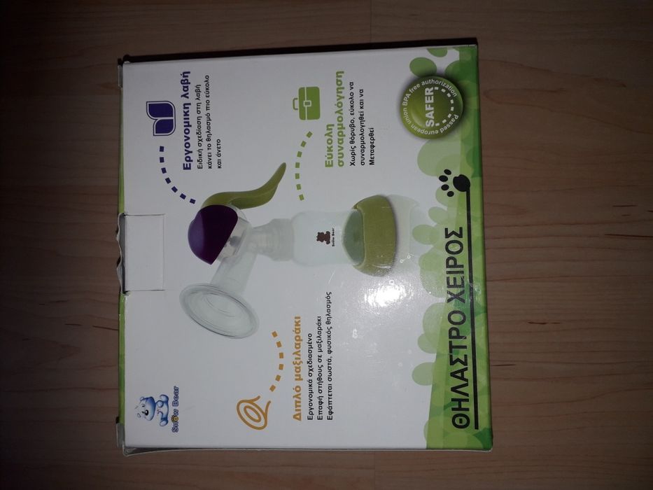 Pompă sân manuală SnowBear cu biberon și capac pentru ținut la frigide