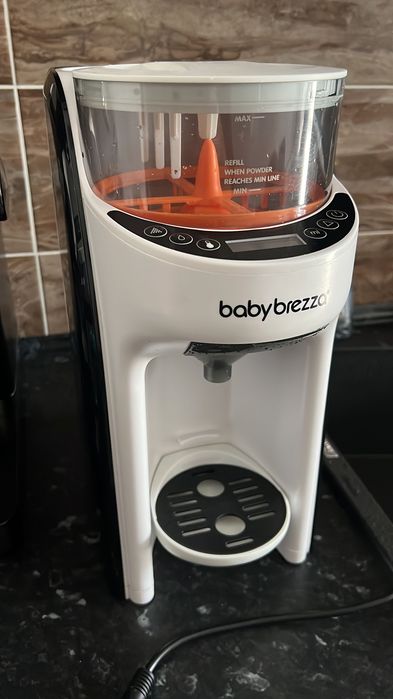 Vând aparat preparare lapte praf pentru bebeluși Baby Brezza Formula Pro Advanced