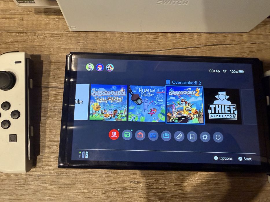Nintendo Switch Oled + игри и калъф