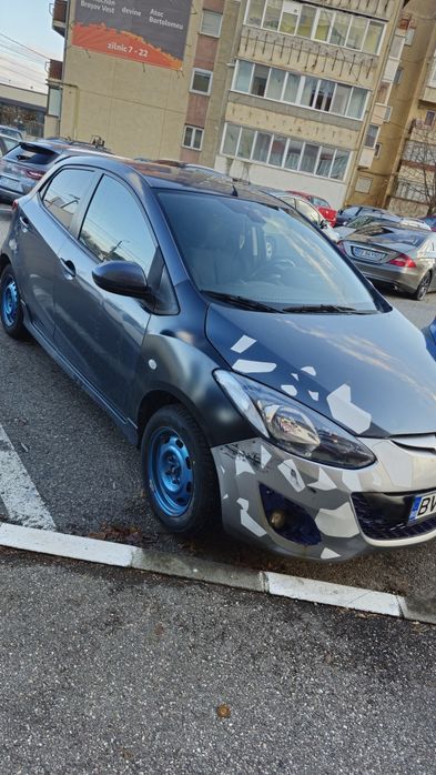 Vând schimb mazda 2 ofer 1500 euro diferenta