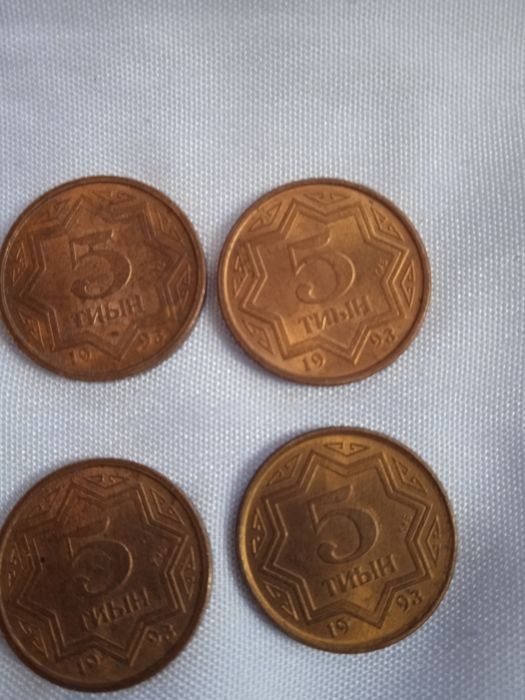 Монеты - тиыны .