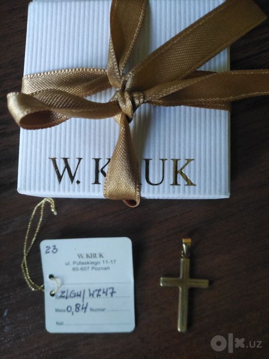 Золотой крестик бренда W. KRUK