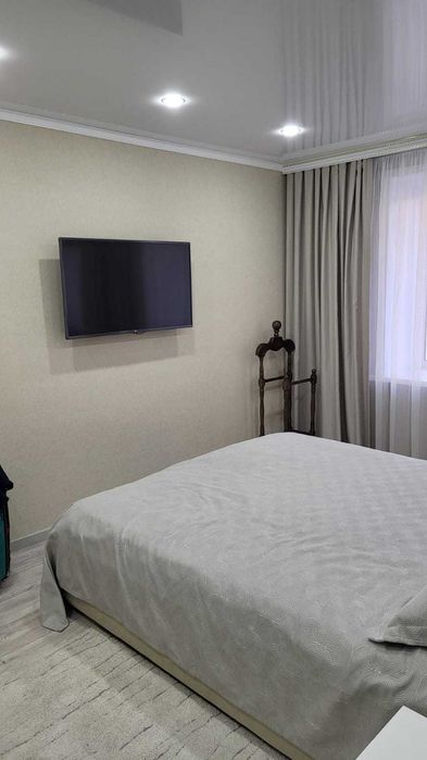 комнатная квартира на среднем этаже