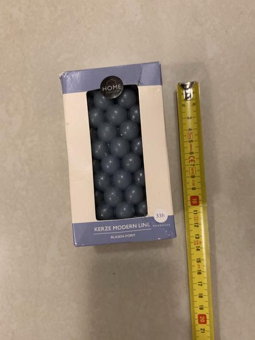 Vand lumanari rosii si gri si aurii